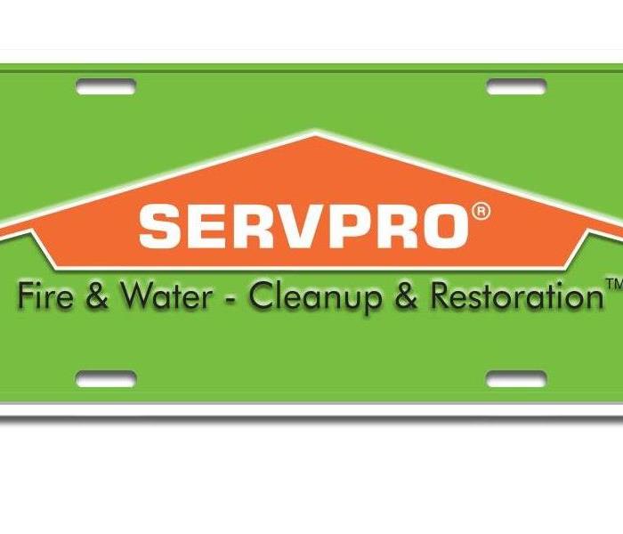 A plaque with the Servpro Logo of SERVPRO Fire & Water- Cleanup & Restoration. 